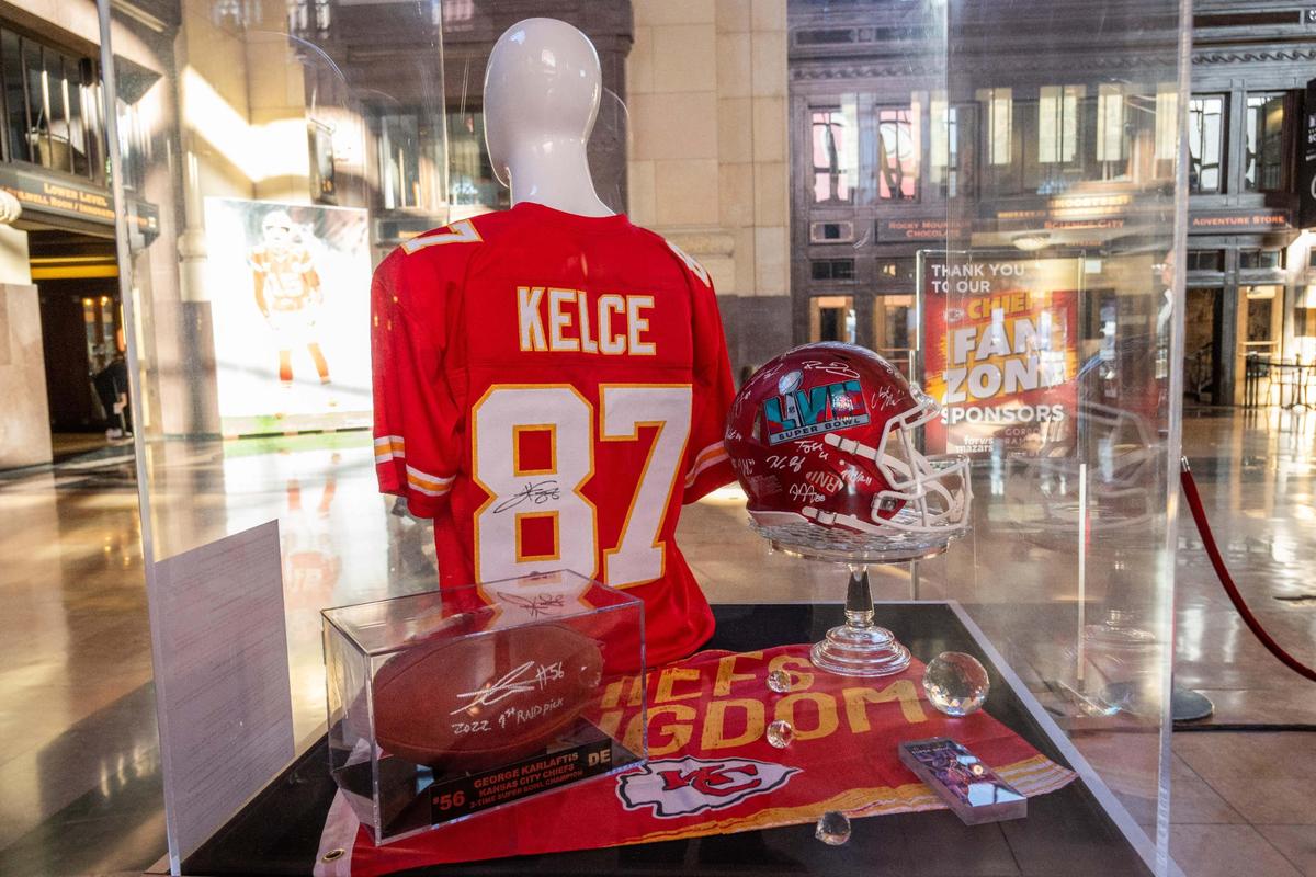 Several items autographed by Chiefs players and coach Andy Reid are being sold to the highest bidder in a silent auction at the Chiefs Fan Zone at Union Station.