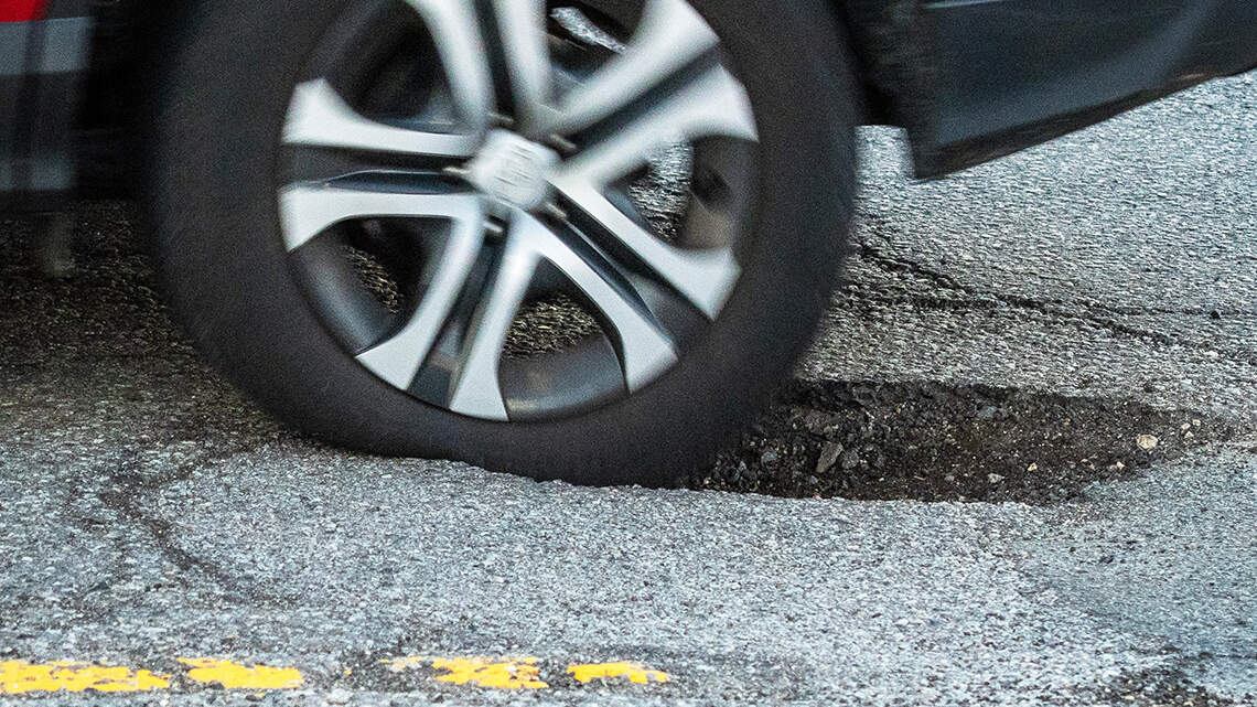 Pothole season got me, and it’ll cost me big. These streets need a better fix | Opinion