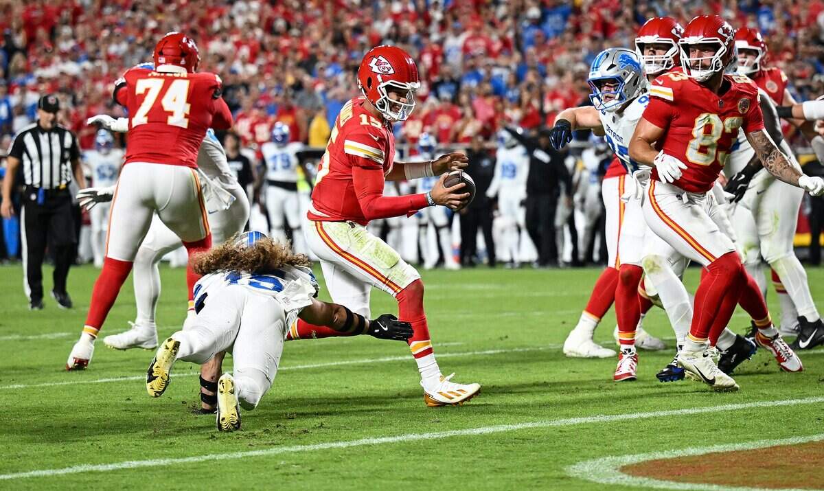 Kansas City Chiefs quarterback Patrick Mahomes (15) runs in for a touchdown late in the second quarter against the Detroit Lions on Sunday, Oct. 12, 2025, at GEHA Field at Arrowhead Stadium.