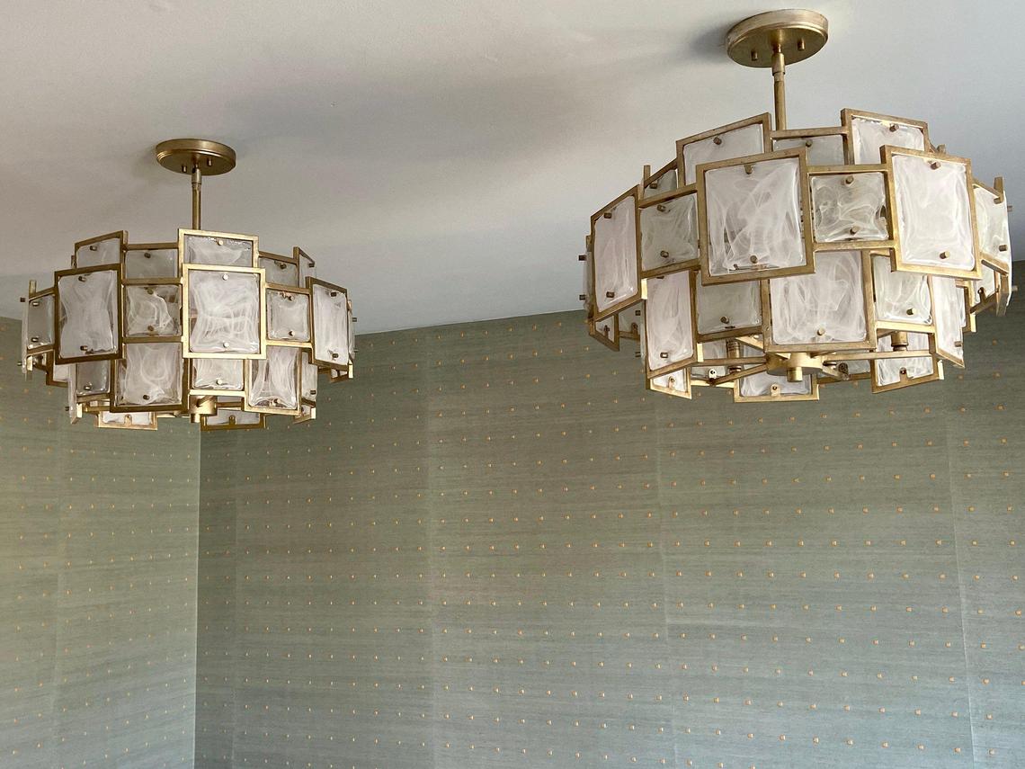 Tamara Day said she used square shapes — in the light fixtures and wallpaper — in designing the dining room of a Leawood home.