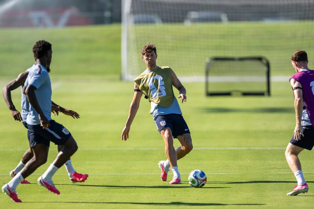 England's John Stones kicks the ball during practice on Victory Field at Swope Soccer Village, Saturday, June 13, 2026, in Kansas City. The team will call Prairie Village home during the World Cup.
