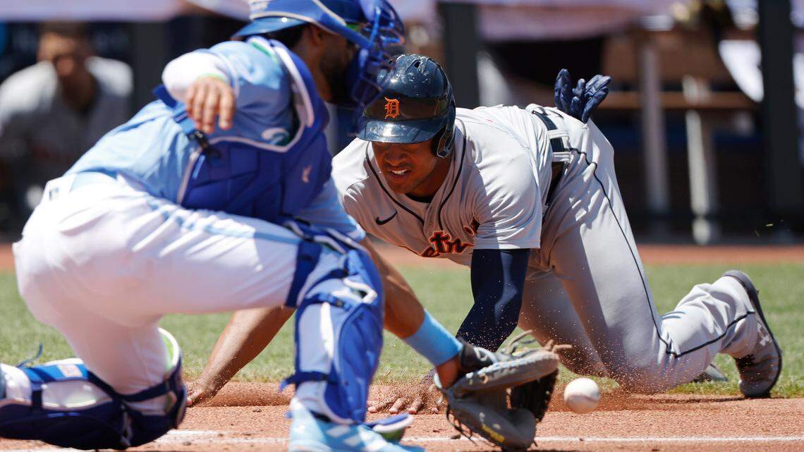 Detroit Tigers’ Jonathan Schoop, attempts to score as Kansas City Royals catcher MJ Melendez catches the throw during the fourth inning of a baseball game in Kansas City, Mo., Wednesday, July 13, 2022. Schoop was originally called safe on the play, but the call was reversed after a challenge by Kansas City. (AP Photo/Colin E. Braley)
