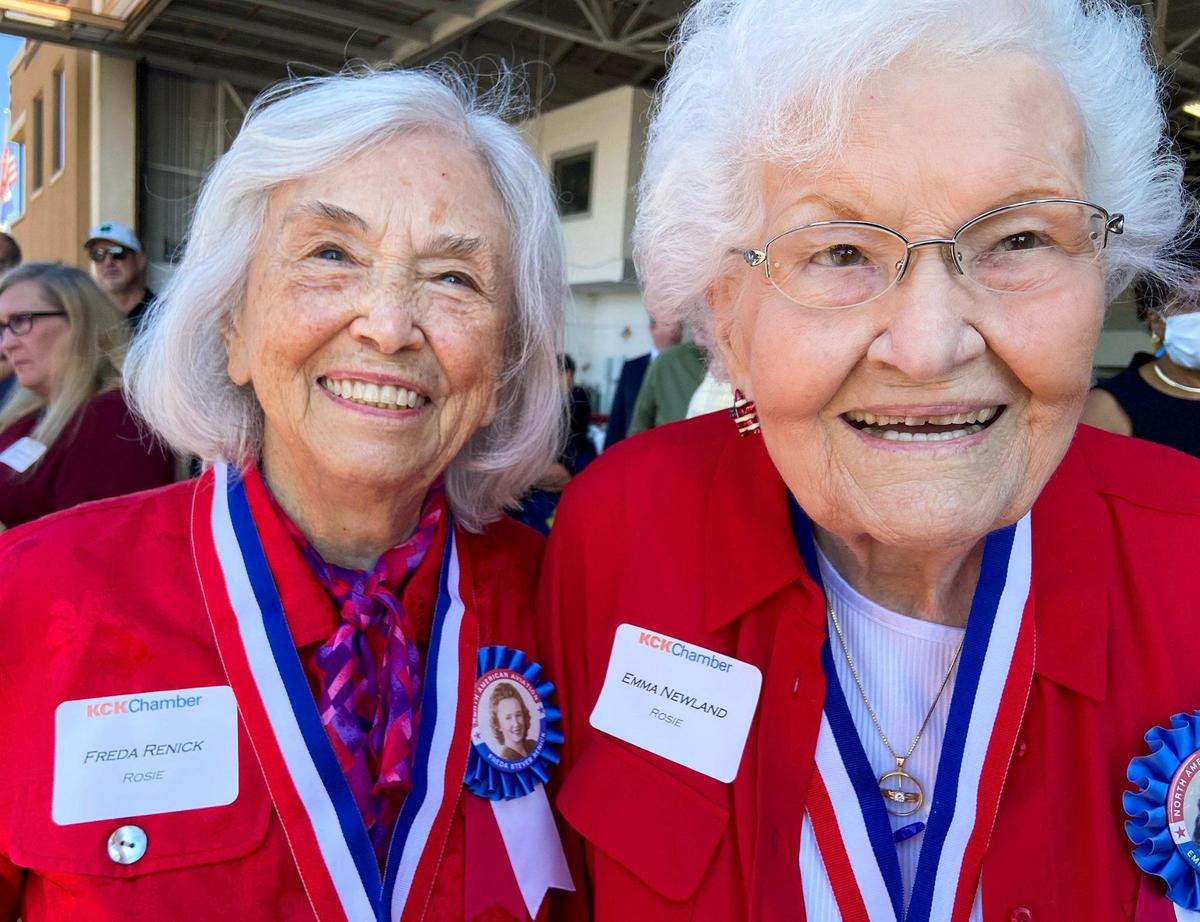 Freda Renick, left, and Emma Newland, both 97-year-olds from Lee’s Summit, helped build planes during World War II as Rosie the Riverters. Rosie’s Reply, a B-25D bomber they helped build at the North American Aviation plant in Fairfax, arrived at Charles B. Wheeler Downtown Airport Monday, Oct. 4, 2021, the first time it has been back to Kansas City since it flew out for World War II. The bomber will fly over the Fairfax Festival Oct. 7.