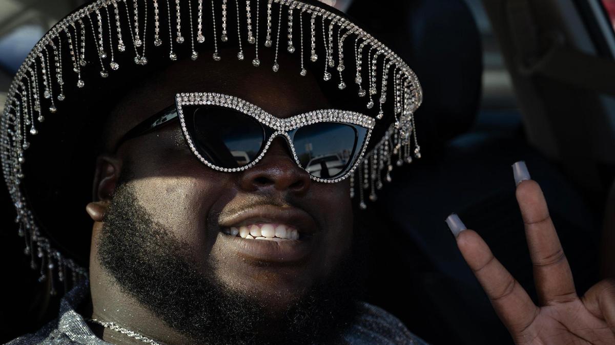 Malachi Taylor waits to get into the parking lot of GEHA Field at Arrowhead Stadium for Beyonce’s concert on Sunday, Oct. 1, 2023.