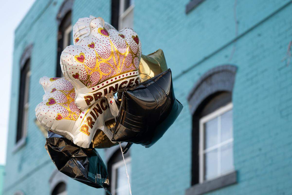 Balloons saying ‘Princess’ were tied to a hand rail outside of 2801 Southwest Blvd., following an shooting on Sunday, Feb. 15, 2026, that left two women were dead and two others injured. The incident happened at a Kansas City nightclub on the city’s West Side.