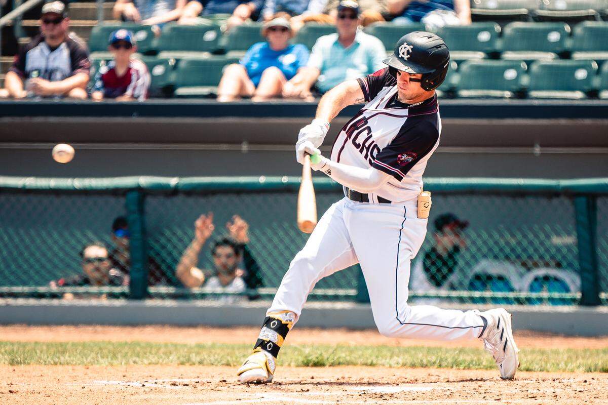Kansas City Monarchs outfielder Travis Swaggerty swings during the Monarchs’ game against the Cleburne Railroaders on Sunday, June 30, 2024, at Legends Field in Kansas City, Kansas.