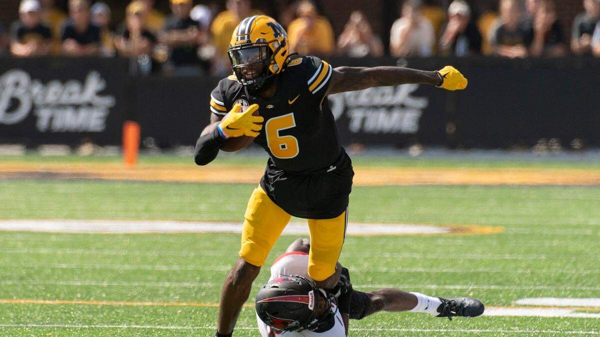 Missouri wide receiver Keke Chism, top, works for some extra yardage against Southeast Missouri State’s Trai Hodges on Saturday, Sept. 18, 2021, in Columbia.