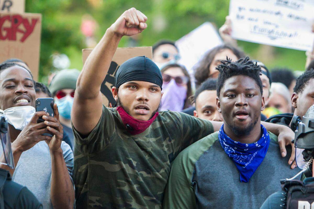 Protesters sounded off at the Country Club Plaza during a protest to bring awareness to the death of George Floyd who died in the custody of Minneapolis police in 2020. The protest turned violent later in the night when stores on the Plaza were vandalized and at least one police car was set on fire. Police used tear gas in an attempt to control the crowd.