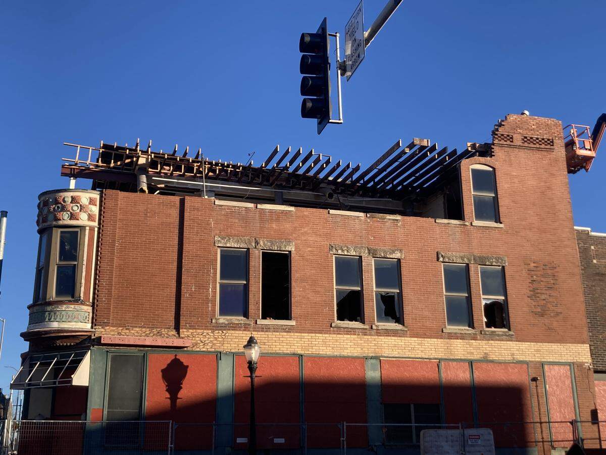Demolition of the 1888 Jeserich building continued, as seen on Wednesday, Jan. 14. Only the bottom half of the building’s Queen Ann tower remains.