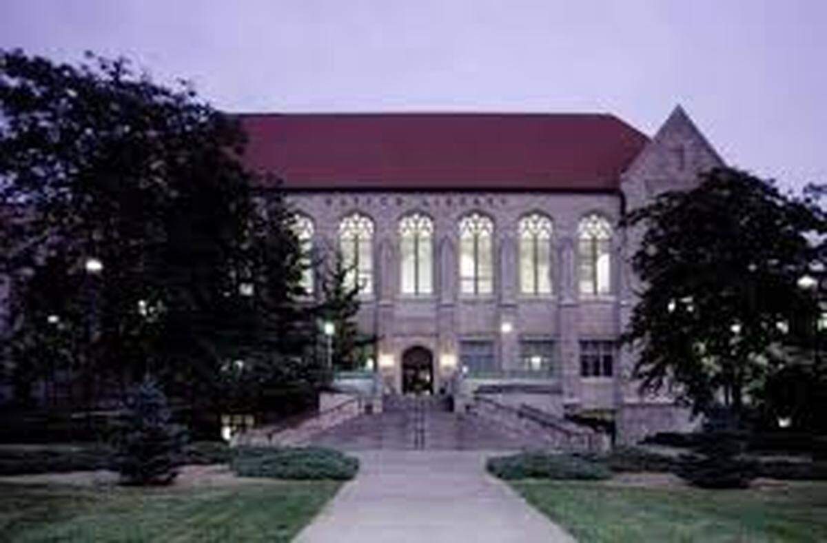 A woman says that she caught the man who raped her watching her through a window while she was in class at Watson Library at the University of Kansas.