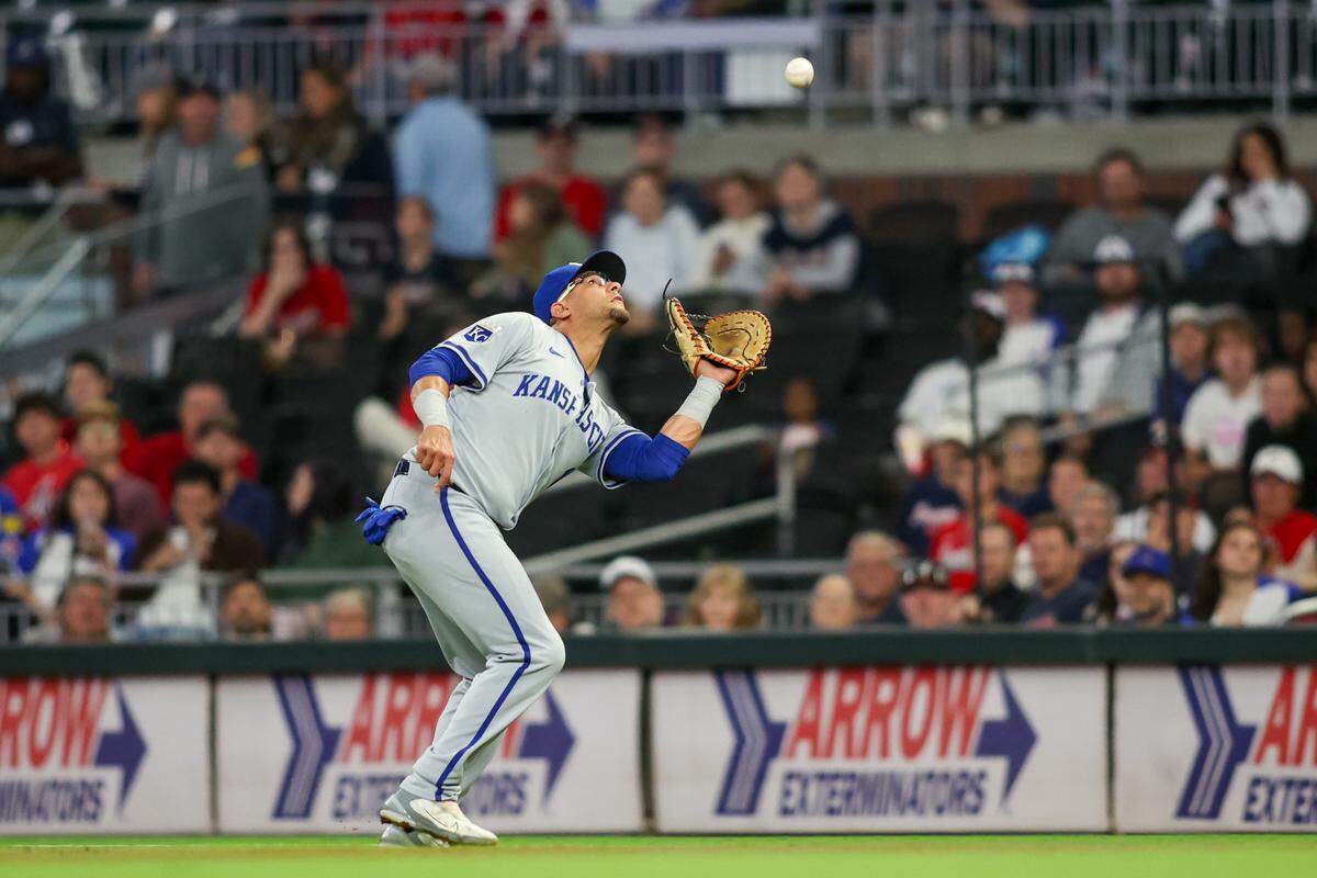 Kansas City Royals first baseman Yuli Gurriel catches a popup during Friday night’s game against the Atlanta Braves at Truist Park.