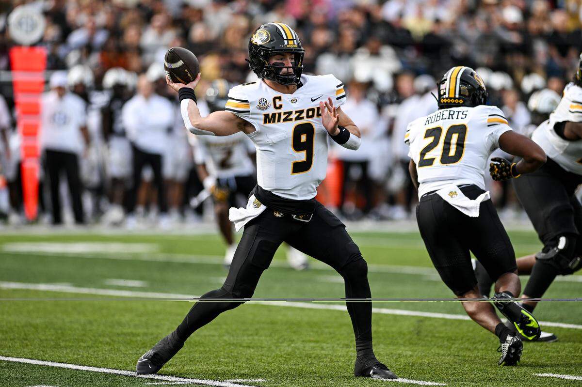 Beau Pribula #9 of the Missouri Tigers passes the ball against the Vanderbilt Commodores in the first half at FirstBank Stadium on October 25, 2025 in Nashville, Tennessee.