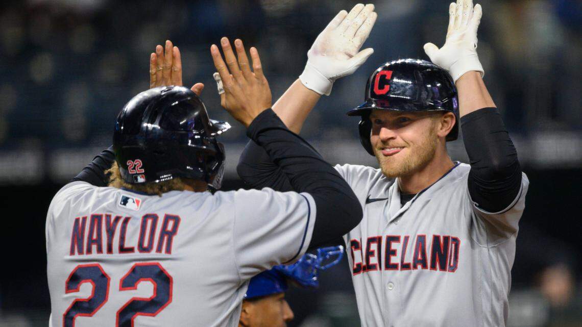 Cleveland Indians’ Jake Bauers, right, celebrates his two-run home run with Josh Naylor during the eighth inning of a baseball game against the Kansas City Royals Tuesday, May 4, 2021, in Kansas City, Mo. (AP Photo/Reed Hoffmann)