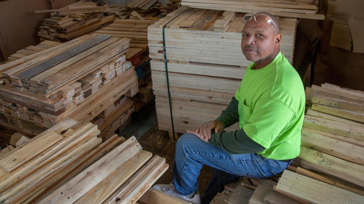 Chuck Ellis working at his shipping pallet construction and refurbishing business. 5510 E 31st Kansas City. Ellis received a loan from Holy Rosary Credit Union through it’s Dream Builder’s loan program.