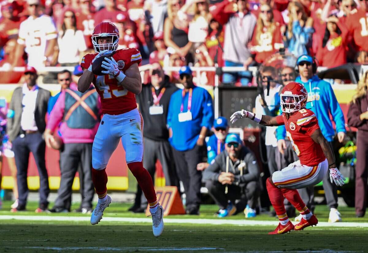 Kansas City Chiefs linebacker Jack Cochrane (43) makes an interception in the second quarter of the Kansas City Chiefs vs. Los Angeles Chargers NFL regular season game at Arrowhead Stadium in Kansas City on Oct. 18, 2026.