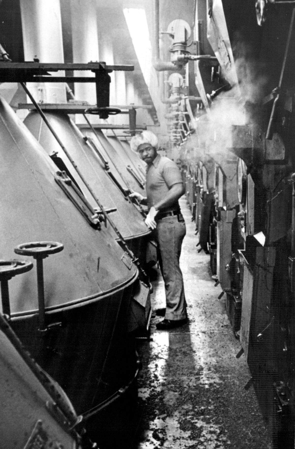 Gaylord Jones operates a roaster at the Folger’s coffee Plant here in 1976.