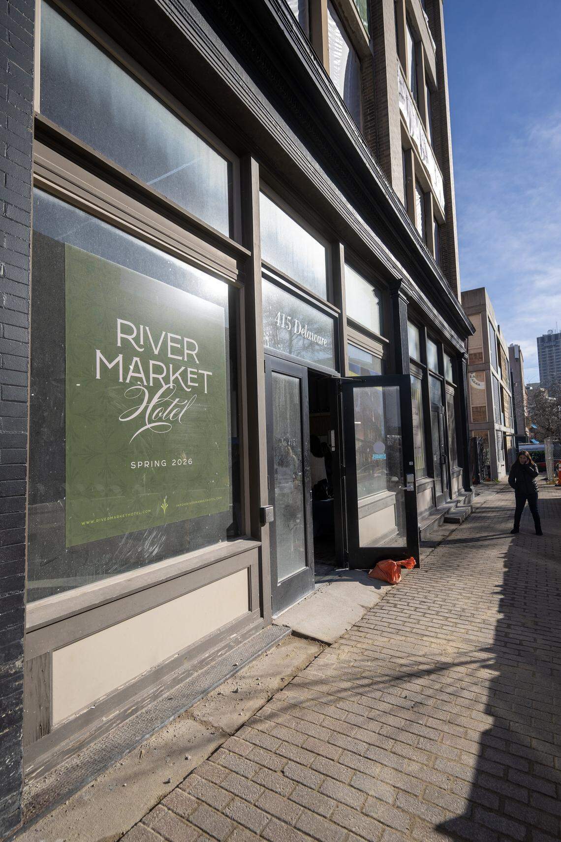 Guests arrive for a ground breaking on Tuesday, Dec. 9, 2025, for the River Market Hotel, a new 45-room boutique hotel, located in a renovated 1880's historic building. The hotel hopes to open in the spring of 2026.