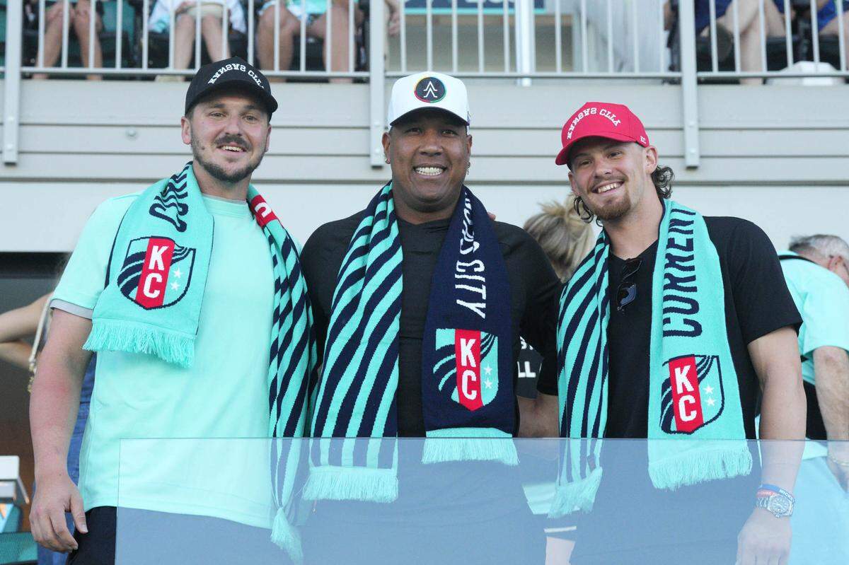 A trio of familiar Royals stars (from left, Vinnie Pasquantino, Salvador Perez and Bobby Witt Jr.) turned out for Sunday afternoon’s KC Current match against Seattle Reign FC at CPKC Stadium in Kansas City.