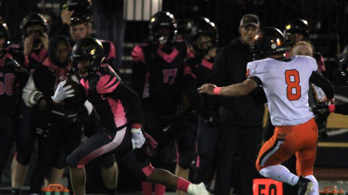Raymore-Peculiar running back Gabe Shanklin (left) broke the right edge against Platte County for a 69-yard touchdown run Friday at Ray-Pec.
