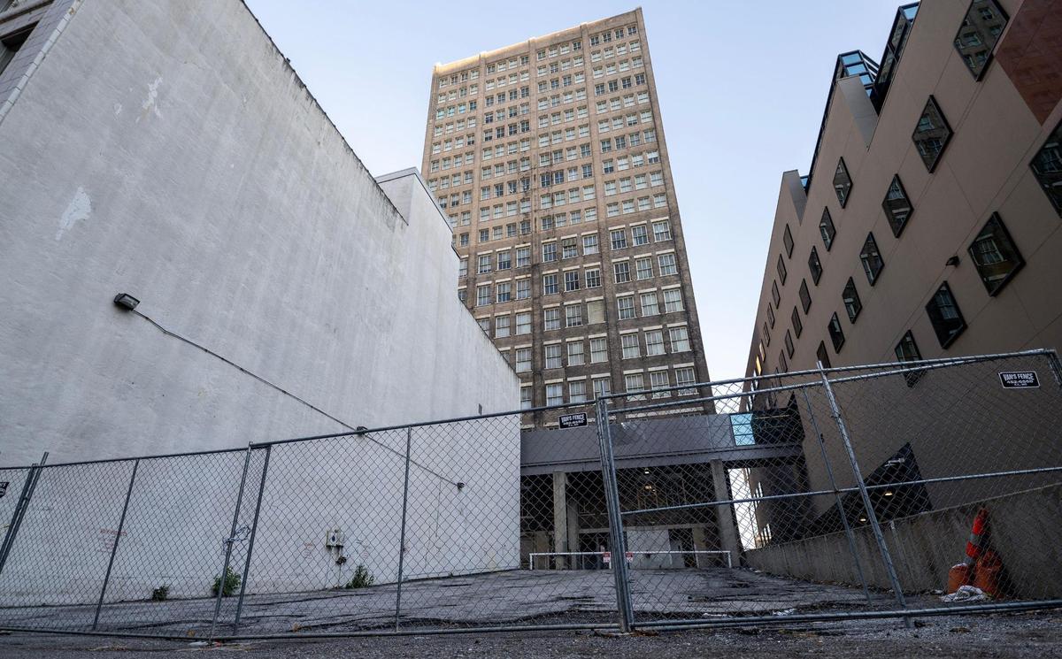 A child was found dead in an alley near 10th Street and Grand Boulevard on Monday in downtown Kansas City. Police say the child died when they fell from a window of the building at the center of the photo.