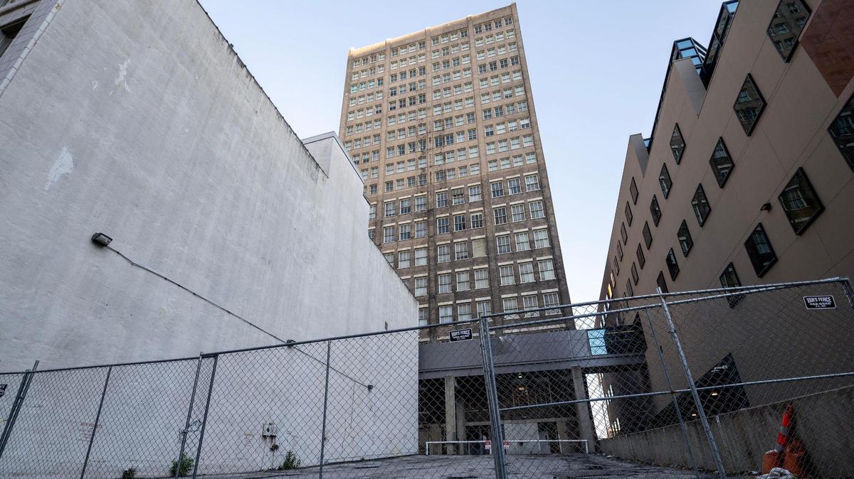 A child was found dead in an alley near 10th Street and Grand Boulevard on Monday in downtown Kansas City. Police say the child died when they fell from a window of the building at the center of the photo.