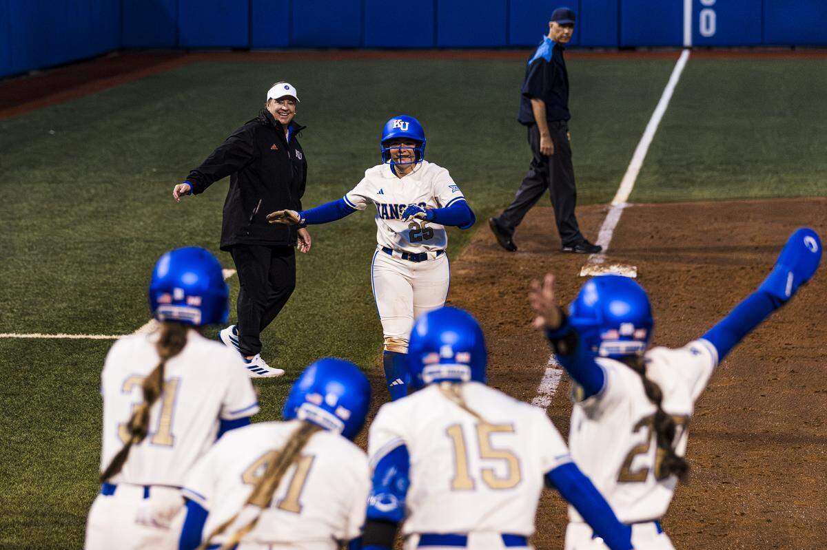 Catcher Bailey Amezcua #25 of the Kansas Jayhawks runs home during a 2026 game between KU and Utah State at Arrocha Ballpark in Lawrence.