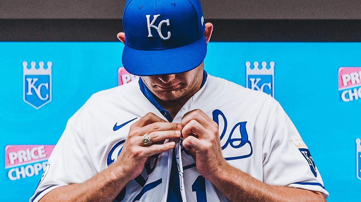 Kansas City Royals draft pick Asa Lacy, the fourth overall pick in the 2020 MLB Draft, puts on a Royals jersey for the first time after signing a contract with the club at Kauffman Stadium in Kansas City, Mo., on June 23, 2020.