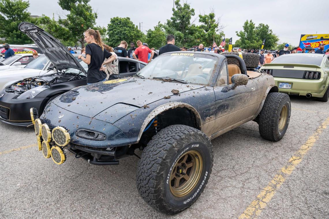 A muddied Mazda Miata parked at the Kansas City stop of the Hot Wheels Legends Tour on Saturday.