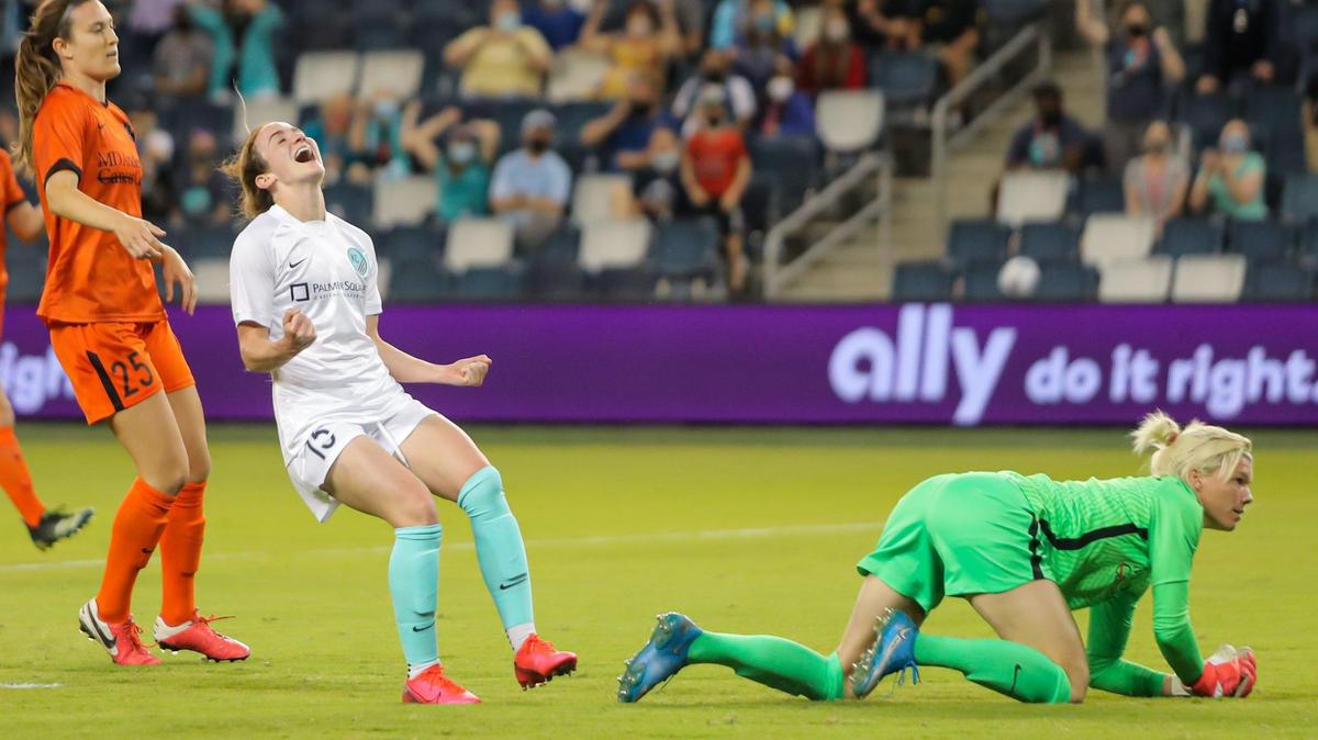 Kansas City’s Michele Vasconcelos celebrates after putting in the Kansas City National Women’s Soccer League lone goal Monday night against the Houston Dash. The Dash spoiled the home opener for KC NWSL, 3-1.