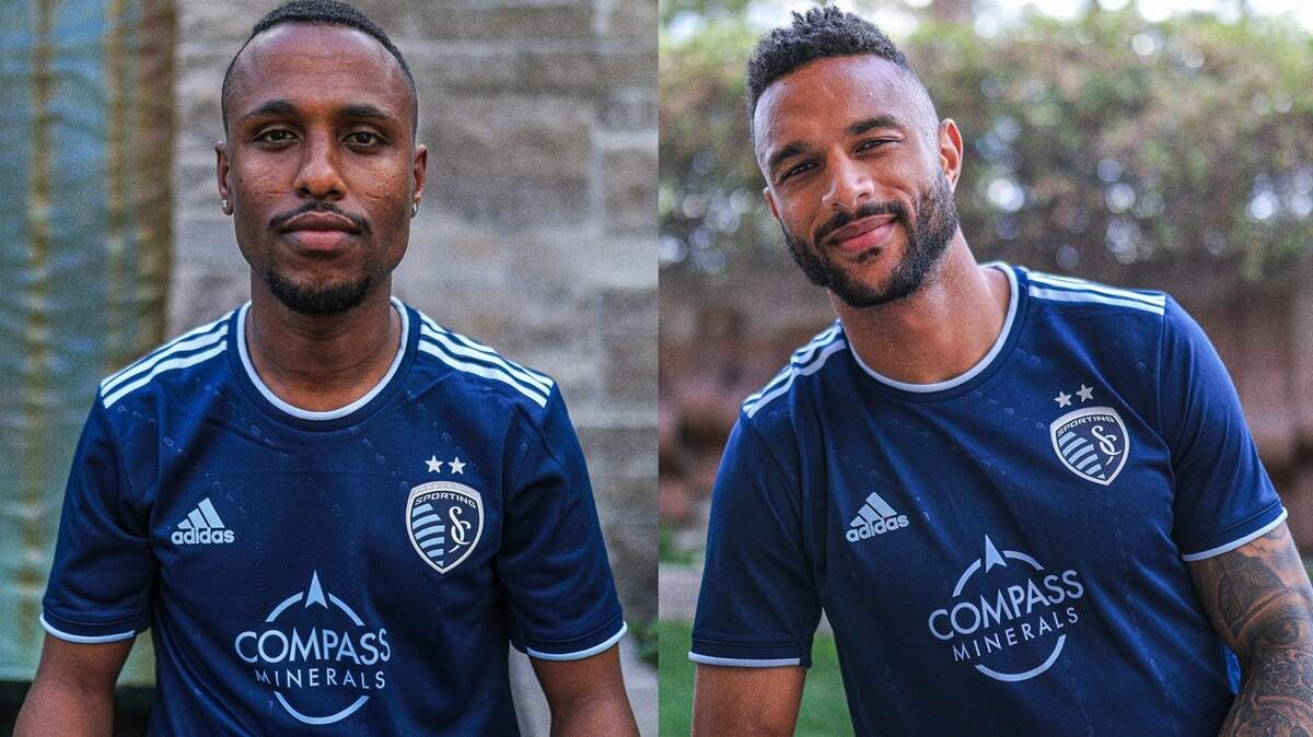 Sporting KC players Gadi Kinda, left, and Khiry Shelton model the club’s alternate kit for the 2022 season.