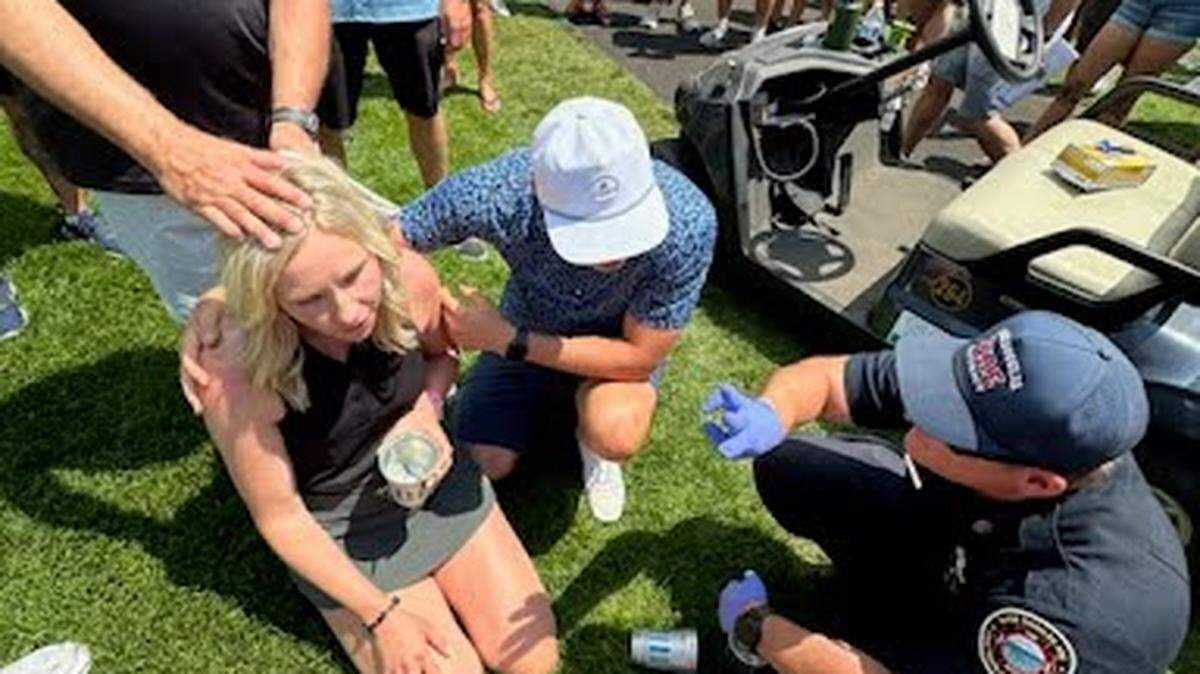 Katie Griffiths received medical attention after being hit in the back of the head by golf ball hit by the Chiefs’ Travis Kelce.