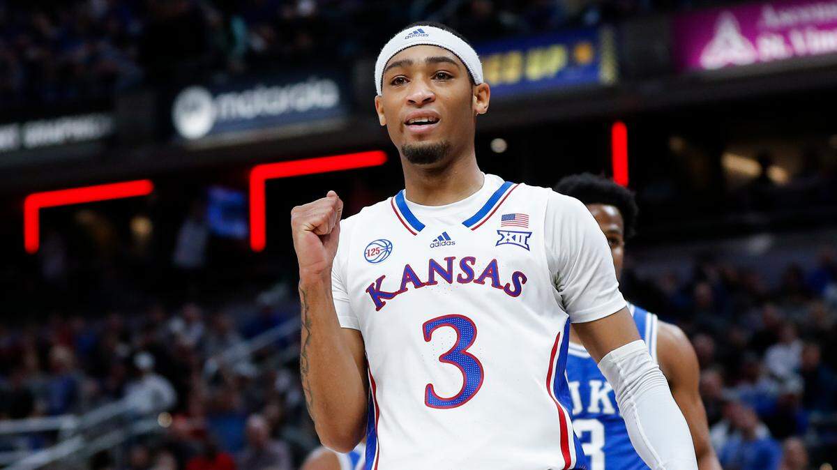 Kansas Jayhawks guard Dajuan Harris Jr. (3) celebrates his teammate drawing a foul from the Duke Blue Devils during the State Farm Champions Classic at Gainbridge Fieldhouse in Indianapolis, Tuesday, November 15, 2022.
