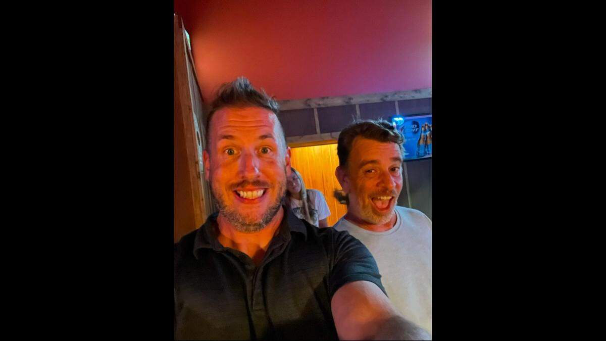 Dennis Andrew Sharkey Kr., 50, (right) is pictured with his longtime friend Cody Snapp in this submitted photo. Sharkey was killed in a shooting on I-29 in Platte County near Kansas City Jan. 10.
