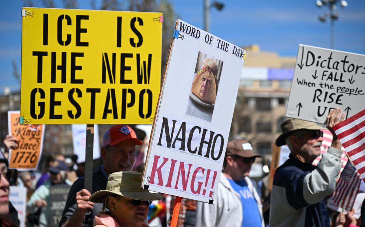 Protesters gathered in Mill Creek Park near the Country Club Plaza on Saturday, March 28, 2026, for a No Kings protest against the Trump administration. It's the third round of No Kings protests that have swept the nation over the past year.
