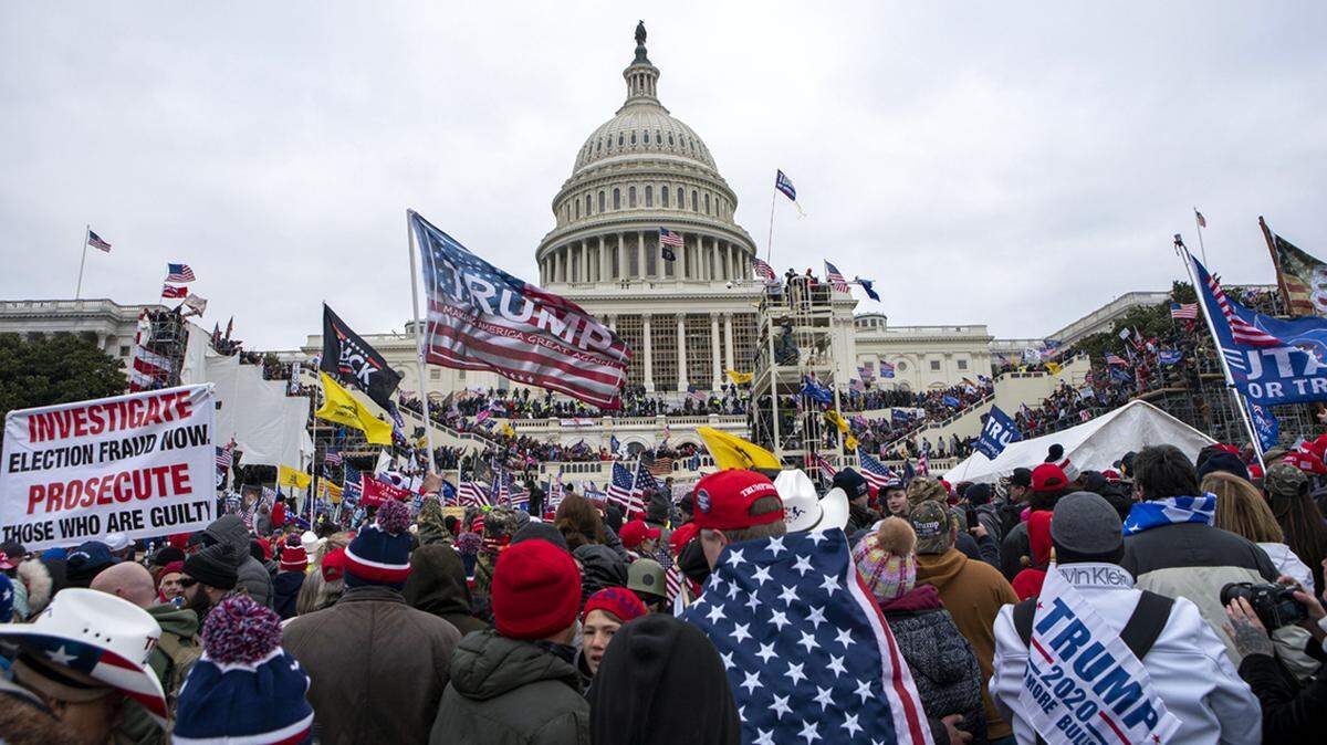 FILE - In this Jan. 6, 2021, file photo insurrectionists loyal to President Donald Trump rally at the U.S. Capitol in Washington.