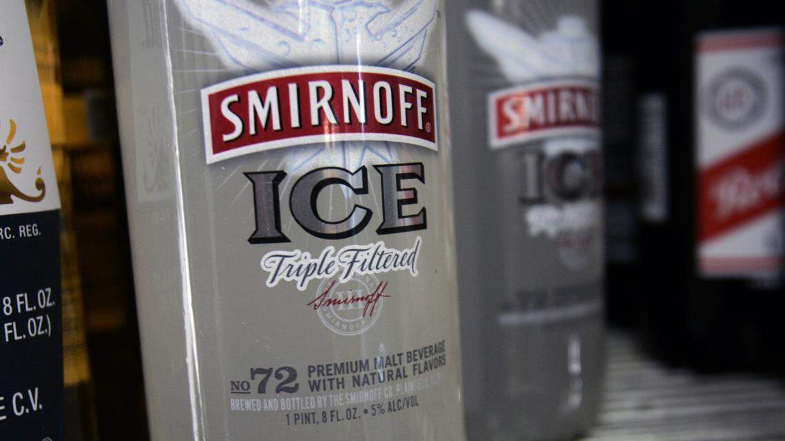 Bottles of Smirnoff Ice are seen on a cooler shelf at a store in this file photo. A 6-year-old boy in Ohio told authorities he was “regularly” given Smirnoff Ice drinks, according to a report.