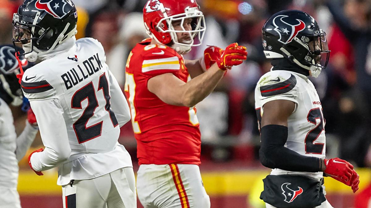 After catching a pass and gaining yardage, Kansas City Chiefs tight end Travis Kelce (87) gestures for a first down in the second half of the AFC Divisional Round playoff game against the Houston Texans on Saturday, Jan. 18, 2025, at GEHA Field at Arrowhead Stadium. The Chiefs defeated the Texans 23-14. 
