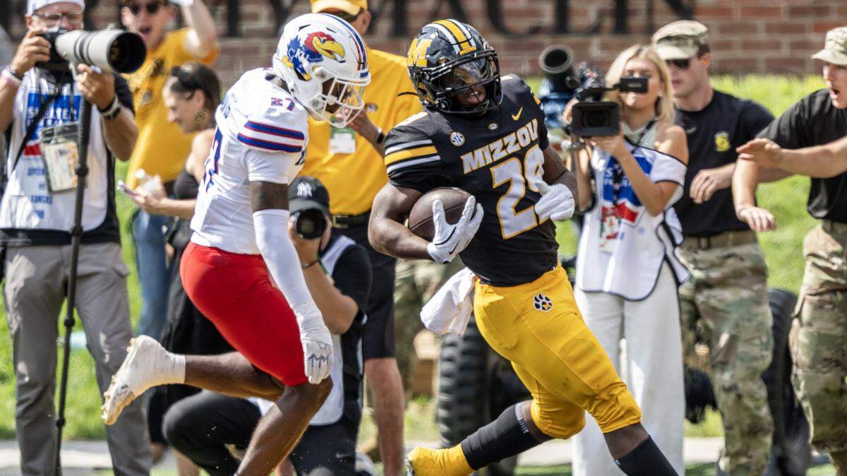 Missouri Tigers running back Ahmad Hardy (29) scores a touchdown in the first quarter during a game against the Kansas Jayhawks at Faurot Field at Memorial Stadium on Saturday, Sept. 6, 2025, in Columbia .