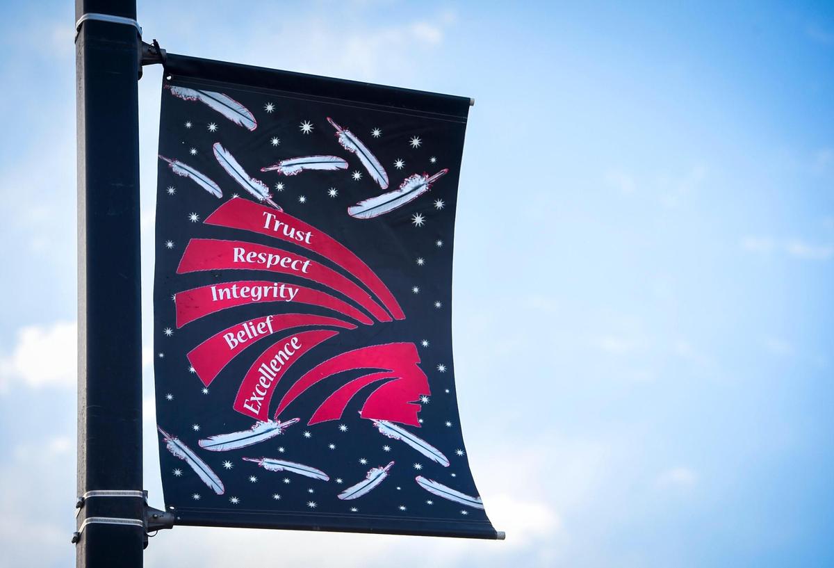 Banners that some consider inappropriate hang outside the Shawnee Mission North field house.