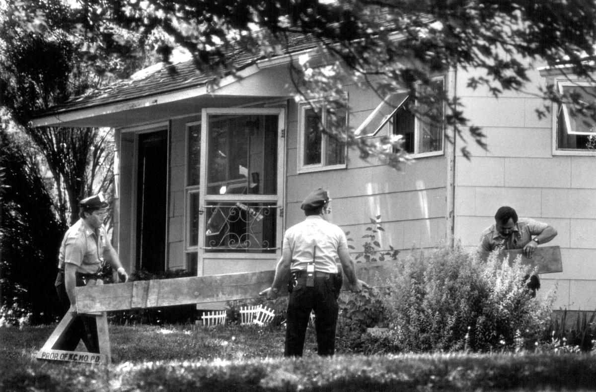 About 30 Kansas City police officers sealed off a two-block area near Grandview in 1984 as they searched the home of Robert J. Gross on 114th Street. Detectives were looking for evidence in three homicides. 