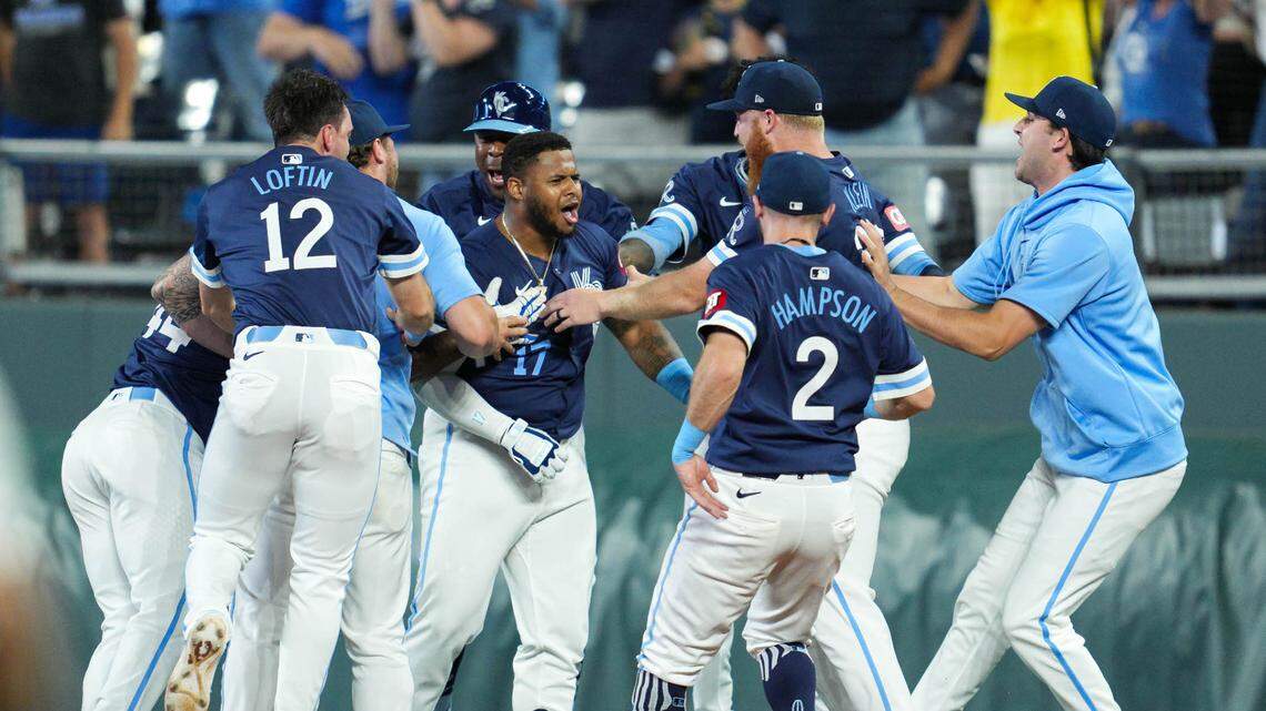 Kansas City Royals designated hitter Nelson Velazquez (17) celebrates with teammates after hitting into a fielder’s choice to defeat the Seattle Mariners at Kauffman Stadium on June 7, 2024.