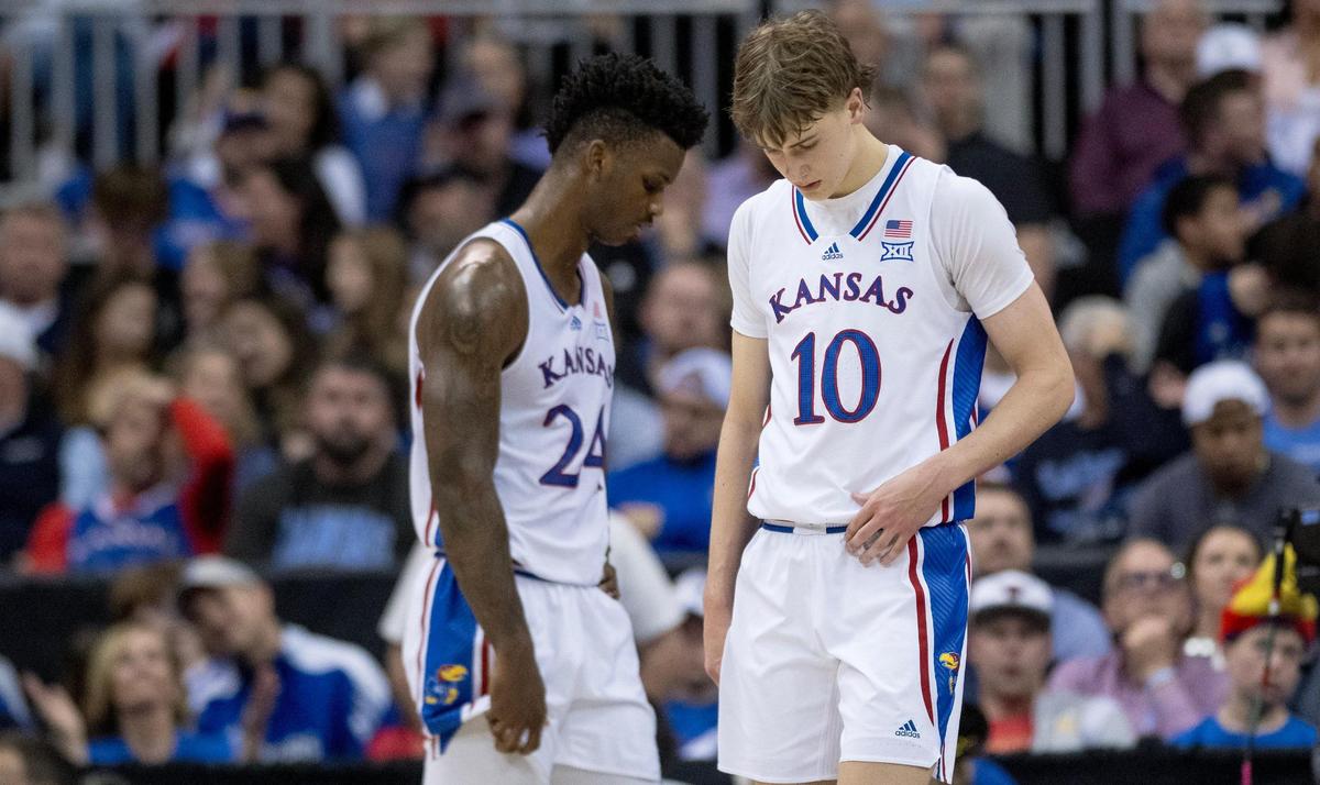 Kansas Jayhawks guard Johnny Furphy (10) and forward K.J. Adams (24) react after giving up a score to the Cincinnati Bearcats during an NCAA basketball game in the Big 12 men’s basketball tournament on Wednesday, March 13, 2024, in Kansas City.