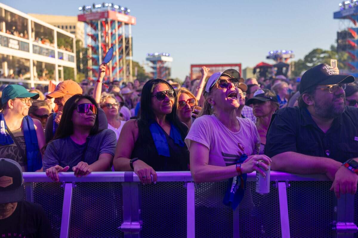 Fans sing along and throw their arms in the air for Sheryl Crow during their FIFA Fan Fest concert at Fan Fest on Friday, July 10, 2026.