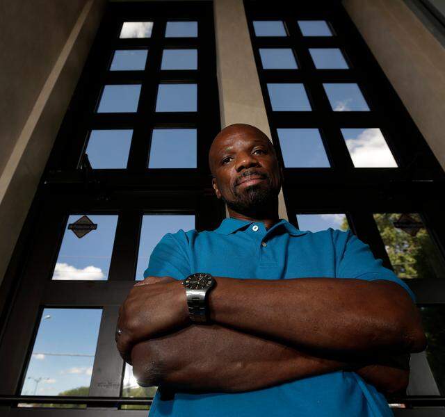 In this Wednesday, Aug. 28, 2013 file photo, Reginald Griffin is pictured at his lawyer’s office in Kansas City, Missouri. Griffin was released on bond in 2012 after the Missouri Supreme Court overturned his murder conviction and life sentence stemming from a 1983 prison stabbing. Prosecutors dismissed the charges. (AP Photo/Charlie Riedel, File)