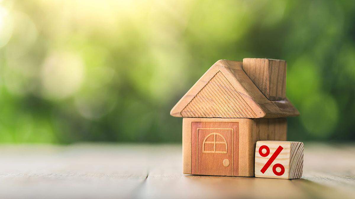 Mortgage rates business concept of investment housing real estate interest rates 3d home appraisal. planning savings money of coins to buy a home concept for property ladder, mortgage, real estate.