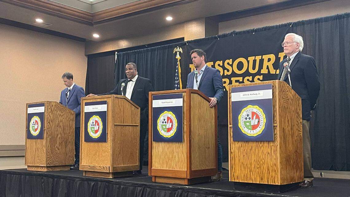 Moderator David Lieb, left, stands on stage with the three candidates for Missouri auditor at a Missouri Press Association candidate forum in Lake Ozark on Friday.