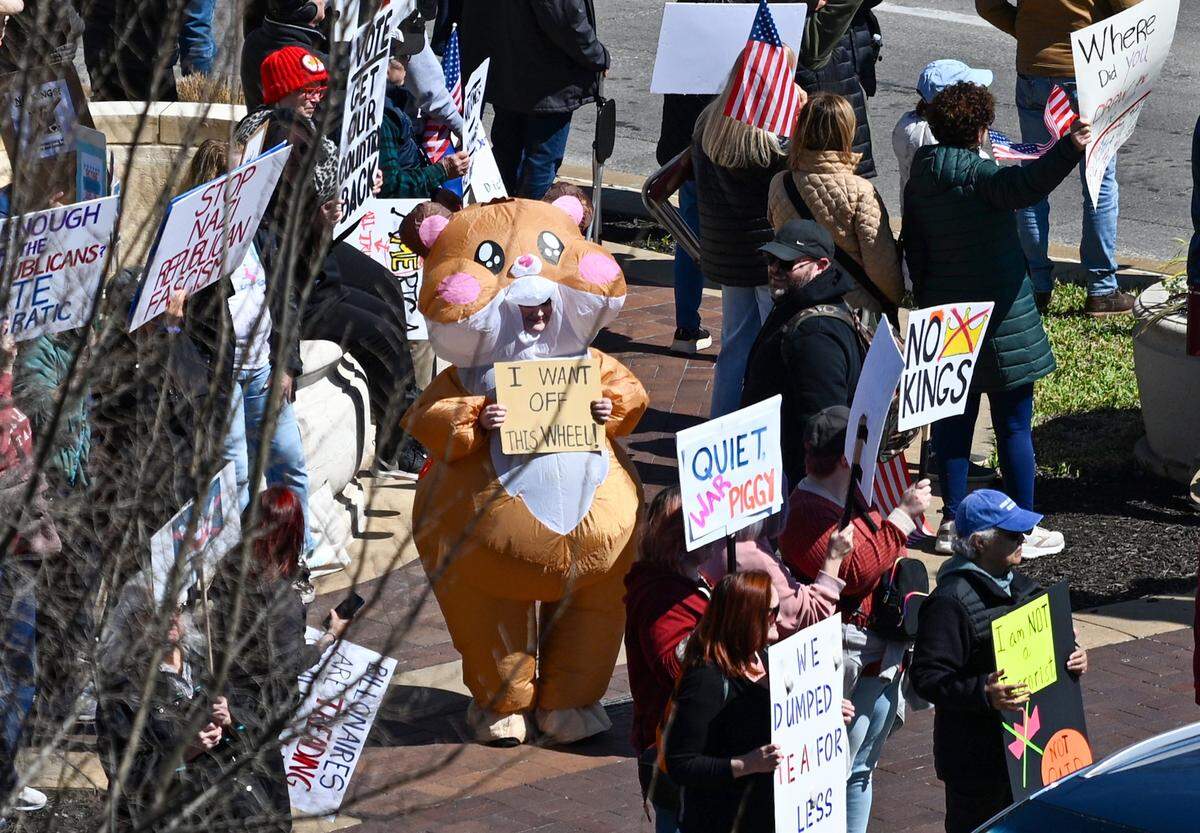 Protesters gathered in Mill Creek Park near the Country Club Plaza on Saturday, March 28, 2026, for a No Kings protest against the Trump administration. It's the third round of No Kings protests that have swept the nation over the past year.