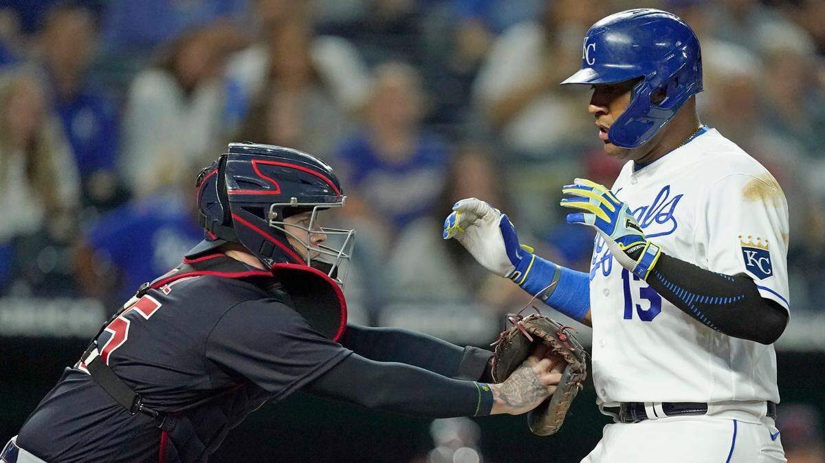 Cleveland Indians catcher Roberto Perez tags out the Royals’ Salvador Perez out as he tries to score on a fielder’s choice during the sixth inning on Thursday, Sept. 30, 2021, at Kauffman Stadium in Kansas City, Mo.
