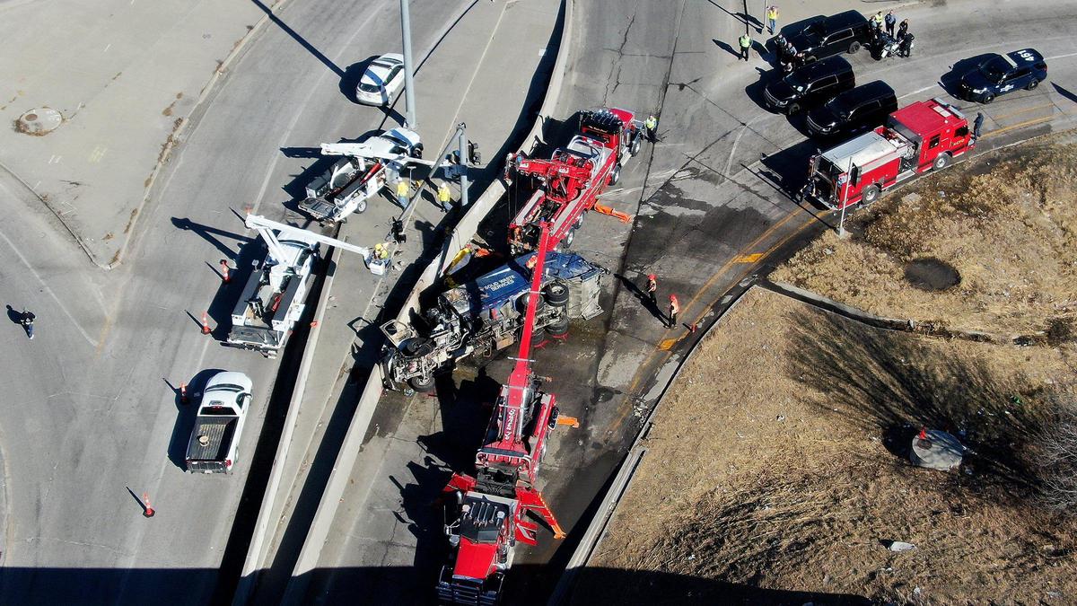 A city worker was killed and two others injured when the garbage truck they were in overturned in a crash and caught fire on the exit from northbound Interstate 435 and Front Street on Kansas City’s east side Tuesday, March 1, 2022.