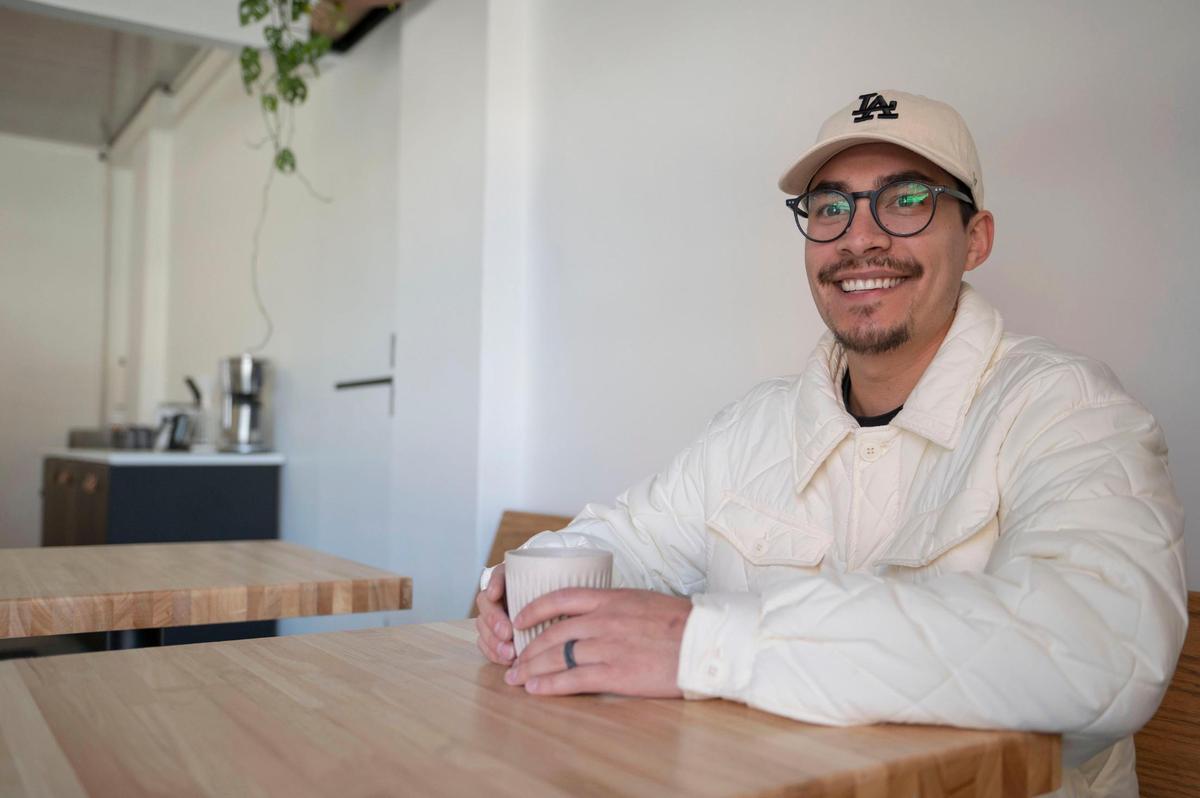 Josh Bella, owner of The Slow Bar in the Crossroads.